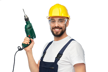 Image showing happy male worker or builder in helmet with drill