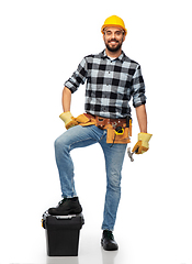 Image showing happy worker or builder in helmet with tool box