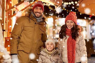 Image showing happy family at christmas market in city