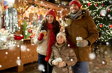 Image showing family with takeaway drinks at christmas market