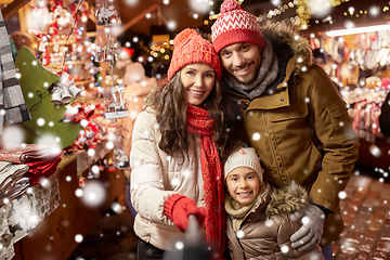 Image showing happy family taking selfie at christmas market