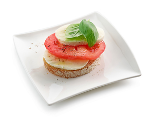 Image showing bruschetta with tomato and mozzarella