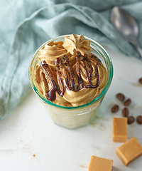 Image showing glass of whipped coffee and caramel mousse cream
