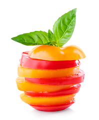 Image showing stack of red and yellow tomato slices