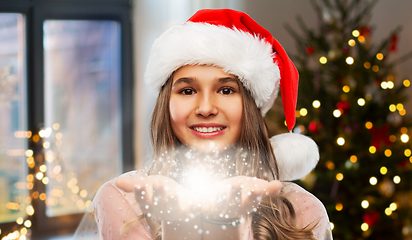 Image showing teenage girl with magical fairy dust on christmas