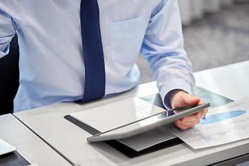 Image showing businessman with tablet pc computer at office