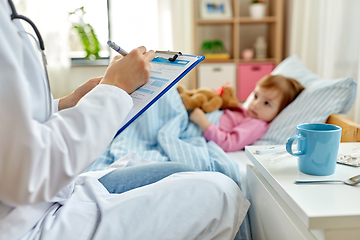 Image showing doctor with clipboard and sick girl in bed at home