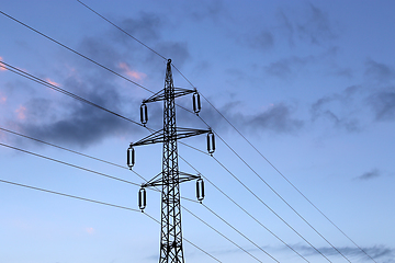 Image showing High voltage tower against the evening cloudy sky