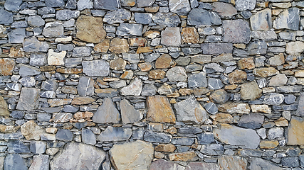 Image showing Old wall from stones of various shapes
