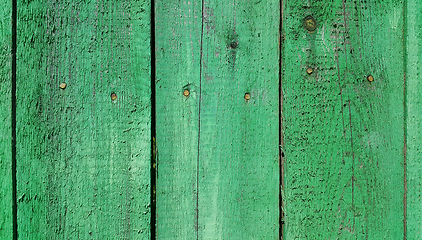 Image showing Texture of weathered wooden green painted fence