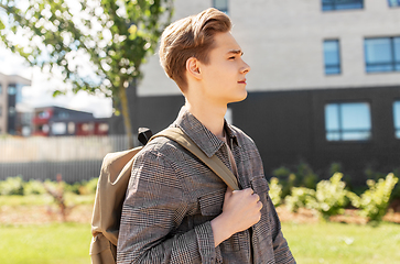 Image showing teenage student boy with backpack in city