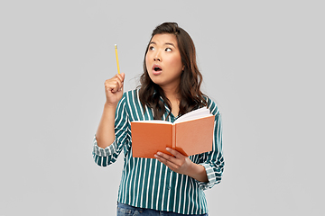 Image showing asian student woman with diary and pencil