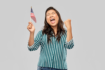 Image showing happy asian woman with flag of america