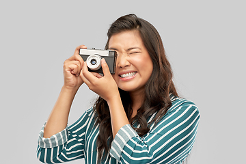 Image showing asian female photographer with digital camera