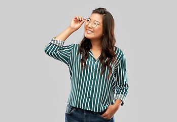 Image showing happy asian woman in glasses or student