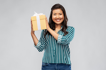 Image showing happy asian woman with birthday present