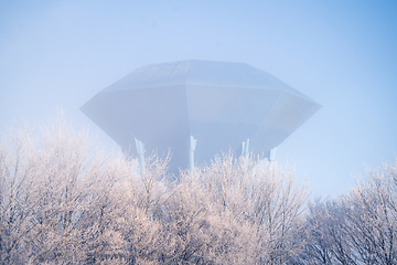 Image showing Futuristic water supply tower on cold morning