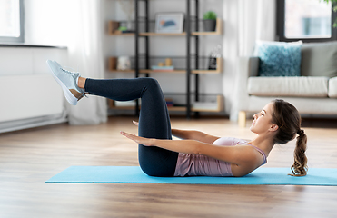 Image showing woman exercising at home