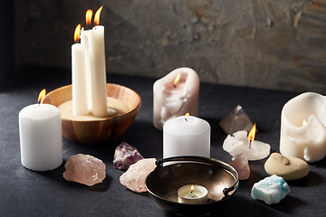 Image showing burning candles and crystals for magic ritual