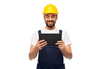 Image showing happy male worker or builder with tablet computer