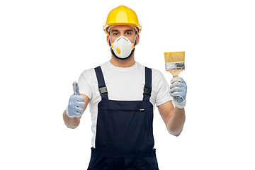 Image showing builder in respirator with brush showing thumbs up