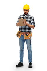 Image showing male worker or builder in helmet with clipboard