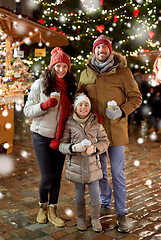 Image showing family with takeaway drinks at christmas market