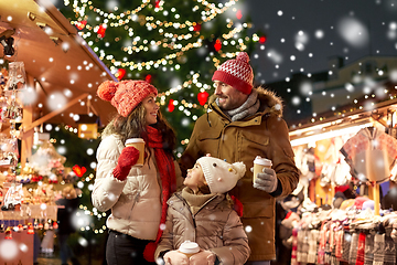 Image showing family with takeaway drinks at christmas market