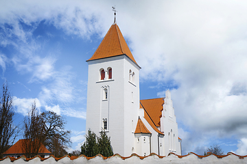 Image showing White church in nordic design behind a wall