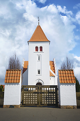 Image showing Gate to a beuatiful white church