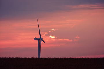 Image showing Windmill in a beautiful violet sunset