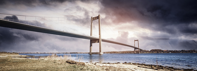 Image showing Bridge over water in a dramatic panorama scenery