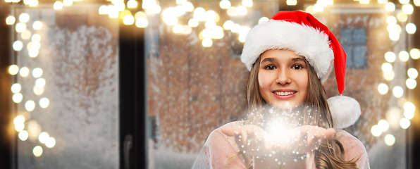 Image showing teenage girl with magical fairy dust on christmas