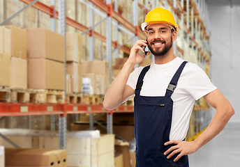 Image showing male worker calling on smartphone at warehouse