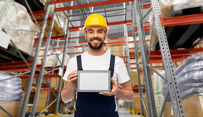 Image showing male worker with tablet computer at warehouse