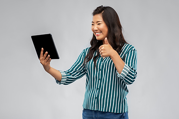 Image showing happy asian woman with tablet pc showing thumbs up