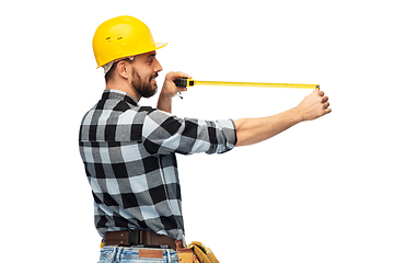 Image showing happy male worker or builder in helmet with ruler