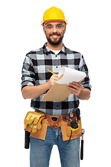 Image showing male worker or builder in helmet with clipboard