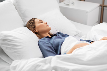 Image showing young woman sleeping in bed at home