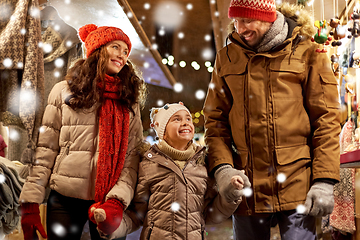 Image showing happy family at christmas market in city