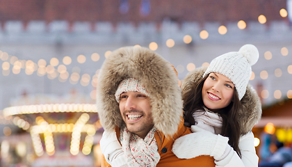 Image showing happy couple over christmas market background