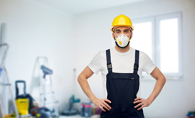 Image showing male worker or builder in helmet and respirator