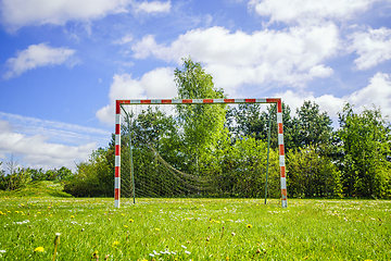 Image showing Old handball goal with a broken net