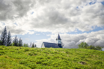 Image showing Small church in a rural scenery in cloudy weather