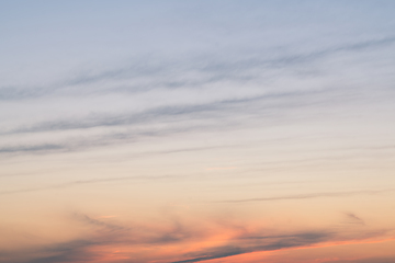 Image showing Afternoon sunset with soft clouds over the sky