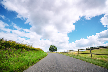 Image showing Countryside landscape with a curvy road