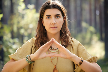 Image showing woman or witch performing magic ritual in forest