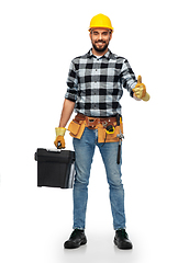 Image showing happy male worker or builder showing thumbs up