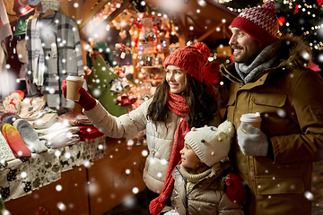 Image showing family with takeaway drinks at christmas market