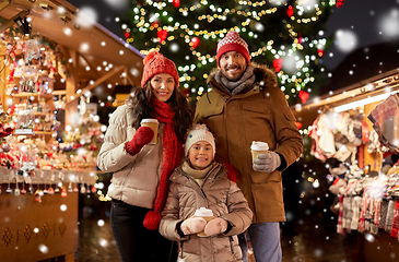 Image showing family with takeaway drinks at christmas market